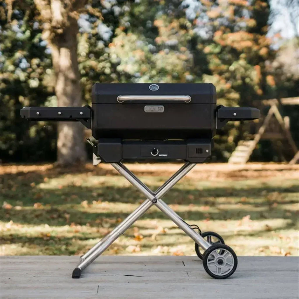 Barbacoa de carbón portátil Masterbuilt con carro, tapa bloqueable y sistema QuickCollapse